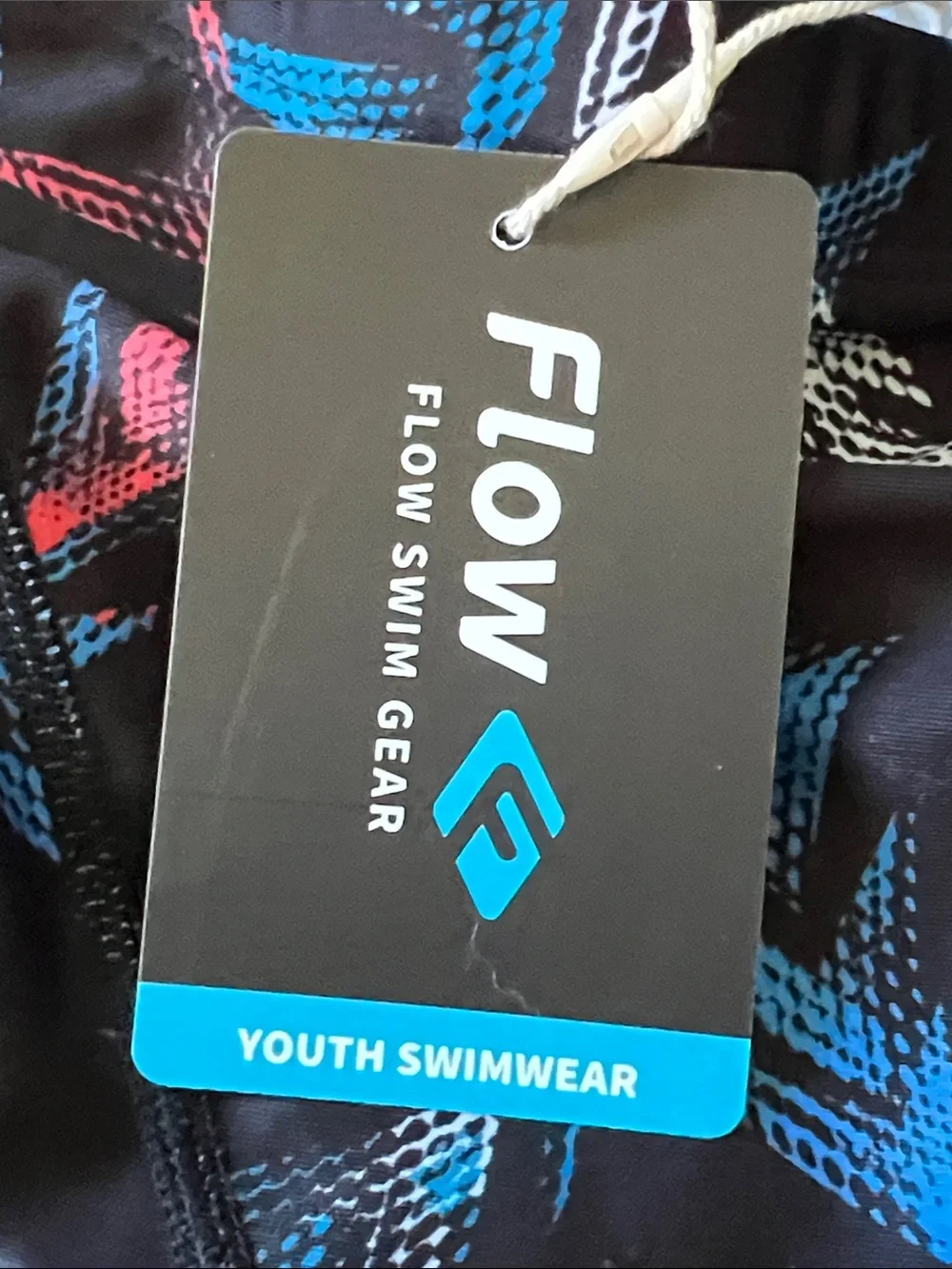 Flow Kids' Black Swim Trunks with Red, Blue & White Pattern